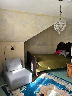 Ein Bett oder Betten in einem Zimmer der Unterkunft Grüne Villa