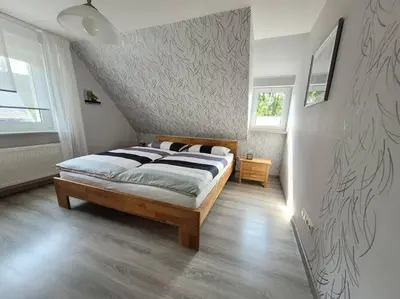 Ein Bett oder Betten in einem Zimmer der Unterkunft Ulrich & Christa´s Ferienhaus