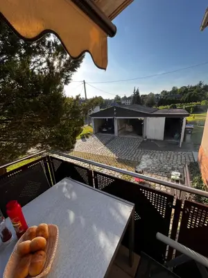 Ein Balkon oder eine Terrasse in der Unterkunft Ferienwohnung Zur Geigenbachtalsperre