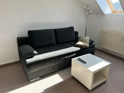 Ein Sitzbereich in der Unterkunft Monteurwohnung bei Pöhl im Vogtland - ideal für Teams, Free Parking