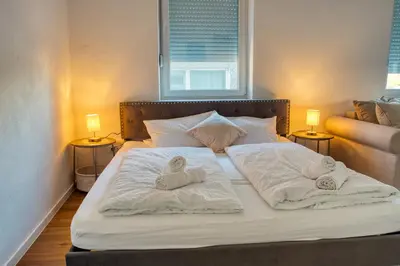 Ein Bett oder Betten in einem Zimmer der Unterkunft WEN BHF NEU & ZENTRAL in Weiden für bis zu 6 Personen