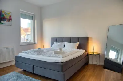 Ein Bett oder Betten in einem Zimmer der Unterkunft WEN BHF NEU & ZENTRAL in Weiden für bis zu 6 Personen