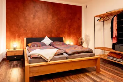 Ein Bett oder Betten in einem Zimmer der Unterkunft Großzügiges Apartment im Loft-Stil