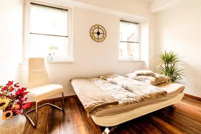 Ein Bett oder Betten in einem Zimmer der Unterkunft Großzügiges Apartment im Loft-Stil