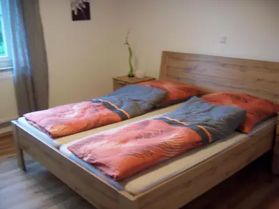 Ein Bett oder Betten in einem Zimmer der Unterkunft Ferienoase im Zottbachtal