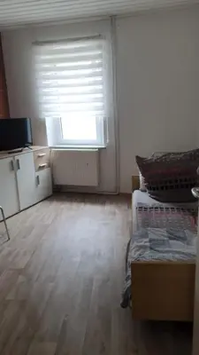Ein Bett oder Betten in einem Zimmer der Unterkunft Arzberger MonteurApartment