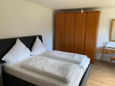 Ein Bett oder Betten in einem Zimmer der Unterkunft Feriendomizil Köngisheide Blick