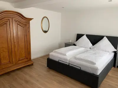 Ein Bett oder Betten in einem Zimmer der Unterkunft Feriendomizil Köngisheide Blick