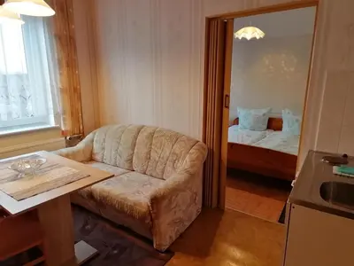 Ein Bett oder Betten in einem Zimmer der Unterkunft Ferienwohnungen Bleyl Rittersgrün