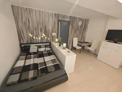 Ein Bett oder Betten in einem Zimmer der Unterkunft Appartment Mühlberg Obermühle