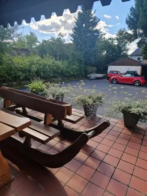 Ein Garten an der Unterkunft Ferienwonung mit 3 Schlafzimmer