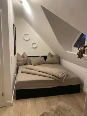 Ein Bett oder Betten in einem Zimmer der Unterkunft attraktives Appartement im Stadtzentrum Plauen Balkon Lift