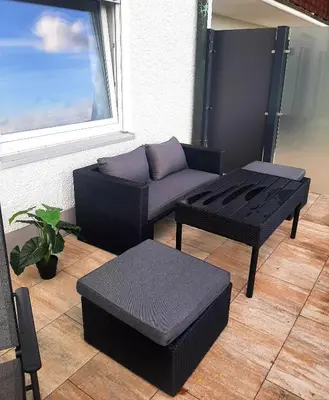 Ein Sitzbereich in der Unterkunft Wohlfühlapartments Zum Hackelstein
