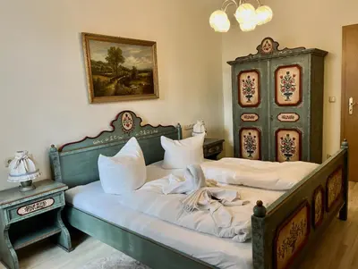 Ein Bett oder Betten in einem Zimmer der Unterkunft 3 Zimmer Apart Bergblick
