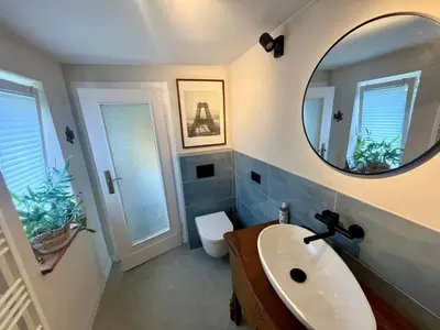 Ein Badezimmer in der Unterkunft Tolles Ferienhaus Frohnatur mit Sauna in ruhiger Lage