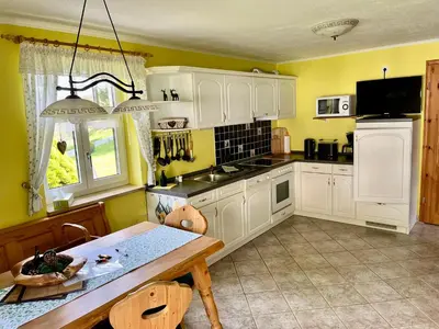 Küche/Küchenzeile in der Unterkunft Ferienhaus Ingrid gemütliches Cottage im Grünen