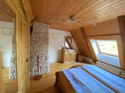 Ein Bett oder Betten in einem Zimmer der Unterkunft Ferienhaus Ingrid gemütliches Cottage im Grünen
