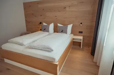 Ein Bett oder Betten in einem Zimmer der Unterkunft Mariandl am Berg