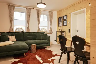Ein Sitzbereich in der Unterkunft Chalet Erwin