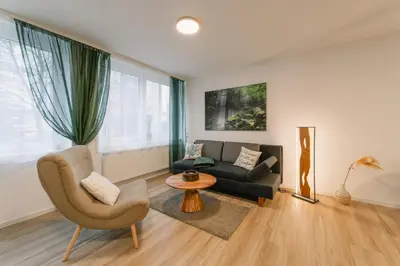 Ein Sitzbereich in der Unterkunft Modernes 2-Zimmer Themen-Apartment im Zentrum