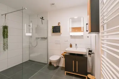 Ein Badezimmer in der Unterkunft Modernes 2-Zimmer Themen-Apartment im Zentrum