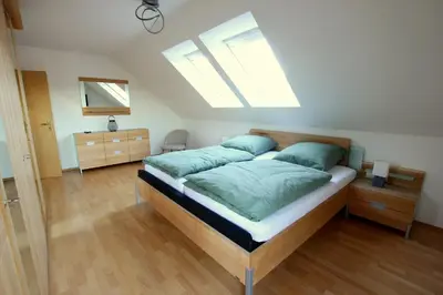 Ein Bett oder Betten in einem Zimmer der Unterkunft Ferienwohnung zur Bugspitze