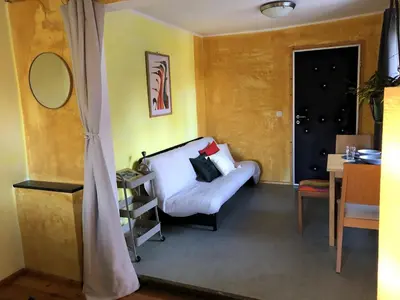 Ein Bett oder Betten in einem Zimmer der Unterkunft Grand Central