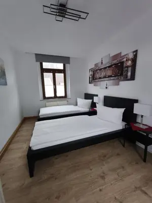 Ein Bett oder Betten in einem Zimmer der Unterkunft Zentral und ruhig in Auerbach