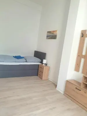 Ein Bett oder Betten in einem Zimmer der Unterkunft Zur Altstadt