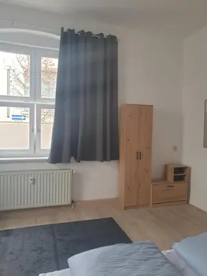 Ein Bett oder Betten in einem Zimmer der Unterkunft Zur Altstadt