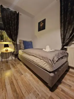 Ein Bett oder Betten in einem Zimmer der Unterkunft Apartment Del Pueblo