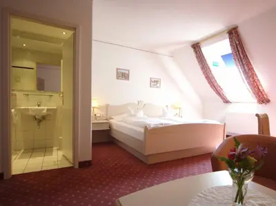 Ein Bett oder Betten in einem Zimmer der Unterkunft Fichtelgebirgshof