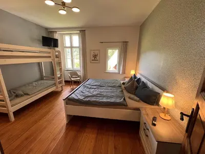 Ein Bett oder Betten in einem Zimmer der Unterkunft Villa Lattermann
