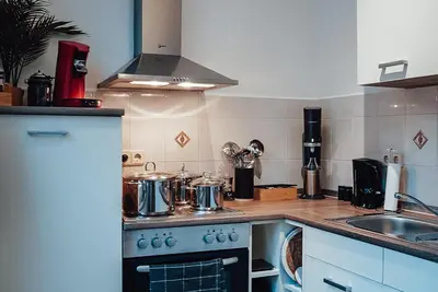 Küche/Küchenzeile in der Unterkunft Fewostaeps- Moderne Unterkunft, zentrumsnah