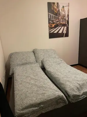 Ein Bett oder Betten in einem Zimmer der Unterkunft Vilseck Apartment