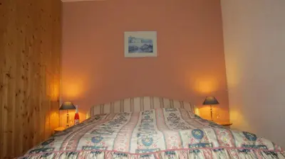 Ein Bett oder Betten in einem Zimmer der Unterkunft Pension Waldhaus