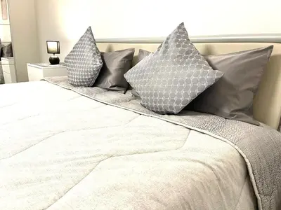Ein Bett oder Betten in einem Zimmer der Unterkunft Stilvolles Designappartment mit Terasse & Garten im idylischem Bindlach