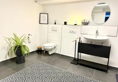 Ein Badezimmer in der Unterkunft Stilvolles Designappartment mit Terasse & Garten im idylischem Bindlach