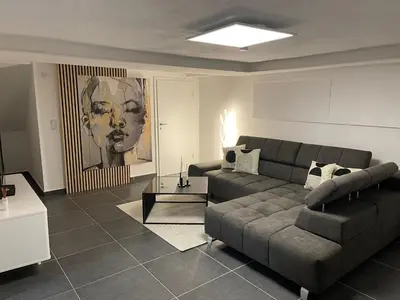 Ein Sitzbereich in der Unterkunft Stilvolles Designappartment mit Terasse & Garten im idylischem Bindlach