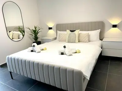 Ein Bett oder Betten in einem Zimmer der Unterkunft Stilvolles Designappartment mit Terasse & Garten im idylischem Bindlach