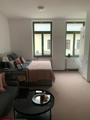 Ein Sitzbereich in der Unterkunft Strassi 1
