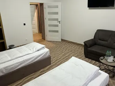 Ein Bett oder Betten in einem Zimmer der Unterkunft Weißes Haus