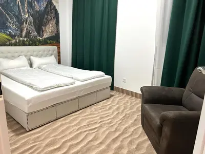 Ein Bett oder Betten in einem Zimmer der Unterkunft Weißes Haus