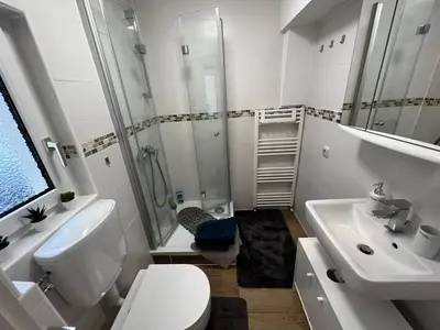 Ein Badezimmer in der Unterkunft Apartment Conan