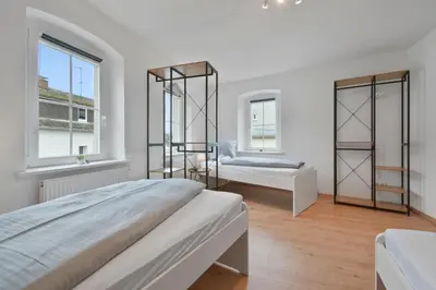 Ein Bett oder Betten in einem Zimmer der Unterkunft HomeTonight Workers Home - Waldershof große Teams willkommen
