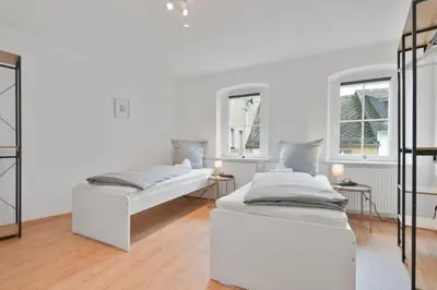 Ein Bett oder Betten in einem Zimmer der Unterkunft HomeTonight Workers Home - Waldershof große Teams willkommen