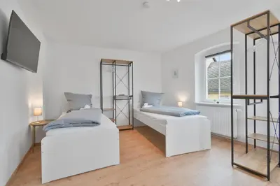 Ein Bett oder Betten in einem Zimmer der Unterkunft HomeTonight Workers Home - Waldershof große Teams willkommen