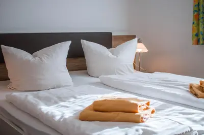 Ein Bett oder Betten in einem Zimmer der Unterkunft Gasthof Blankenberg