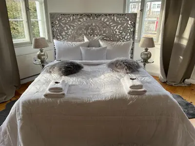 Ein Bett oder Betten in einem Zimmer der Unterkunft Feine Wohn und Schlafstuben im Herrenhaus I UNESCO Welterbe I Parkplatz I Erzgebirge I Waldbühne