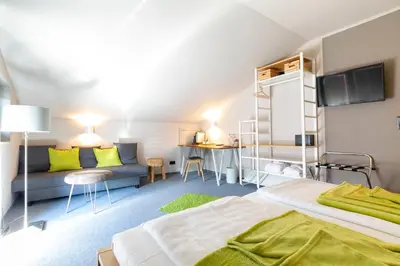 Ein Bett oder Betten in einem Zimmer der Unterkunft Hotel Restaurant Brigitte